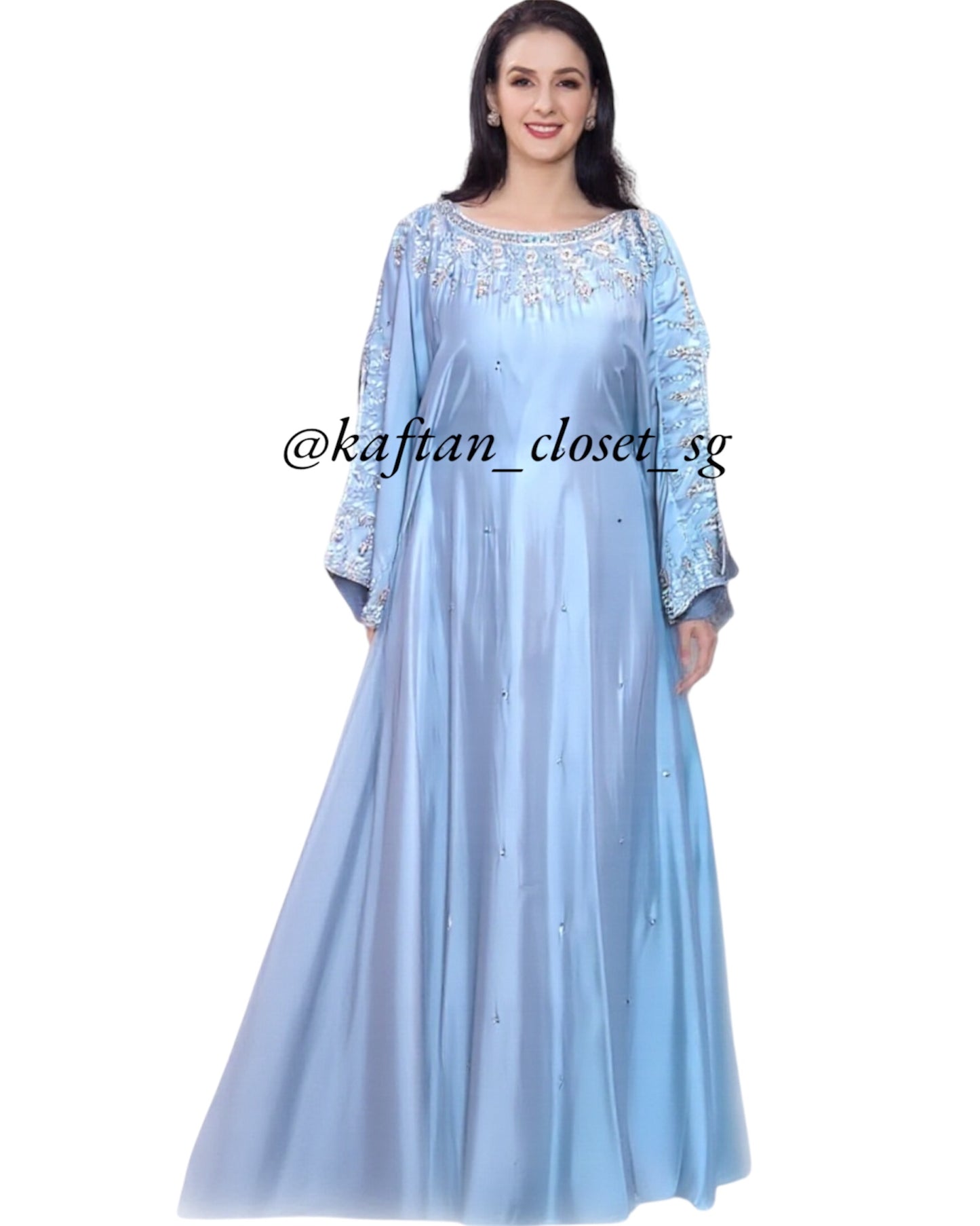 Beautiful female model wearing baby blue open sleeves kaftans with white and pearl beadwork