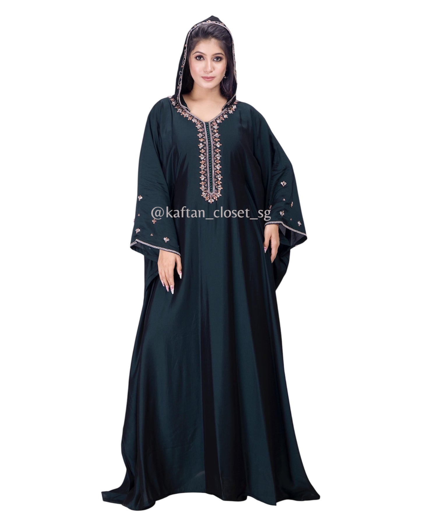 Model wearing midnight green hoodie style embelished kaftan