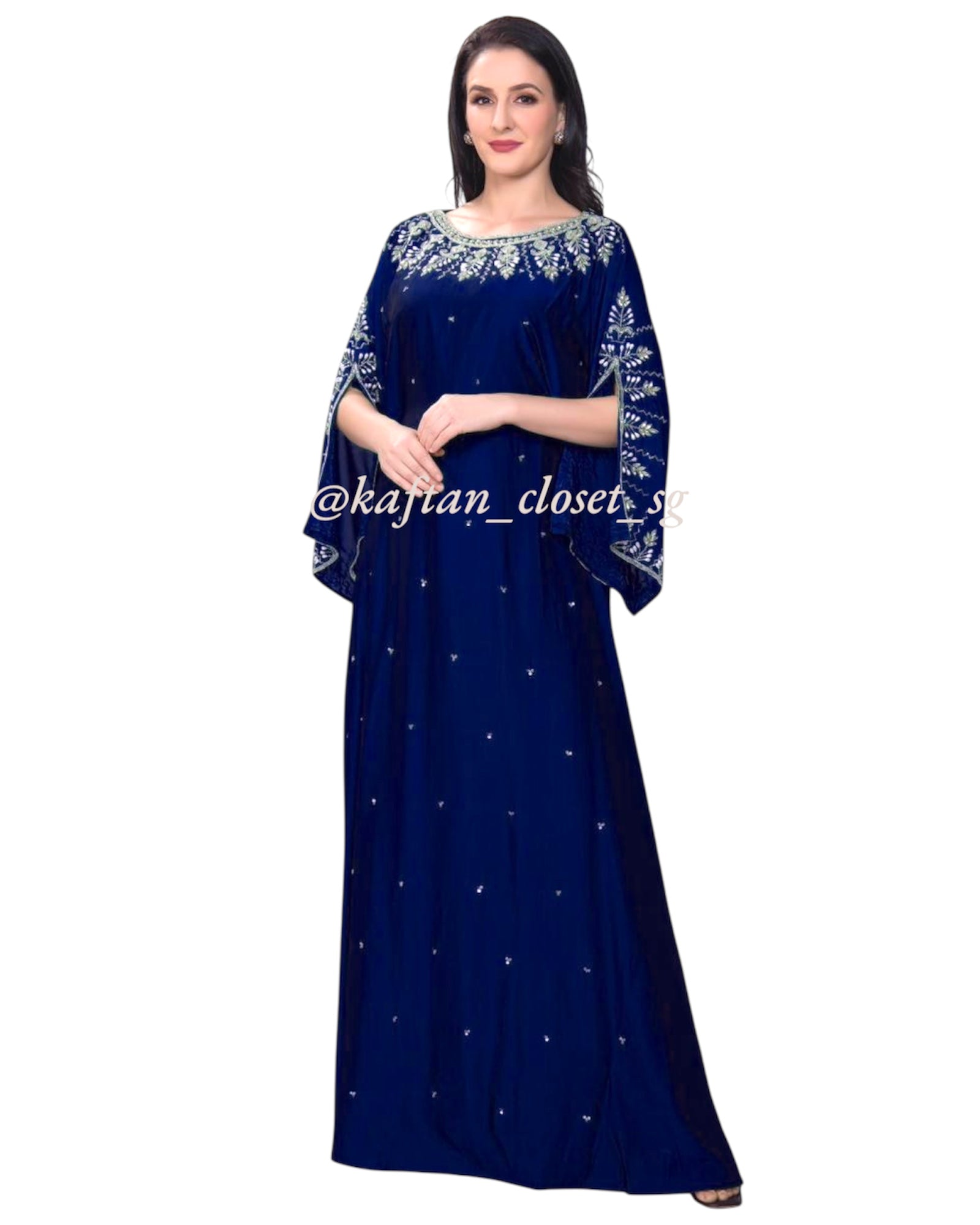 Beautiful female model wearing Navy blue open sleeves kaftans with white and pearl beadwork