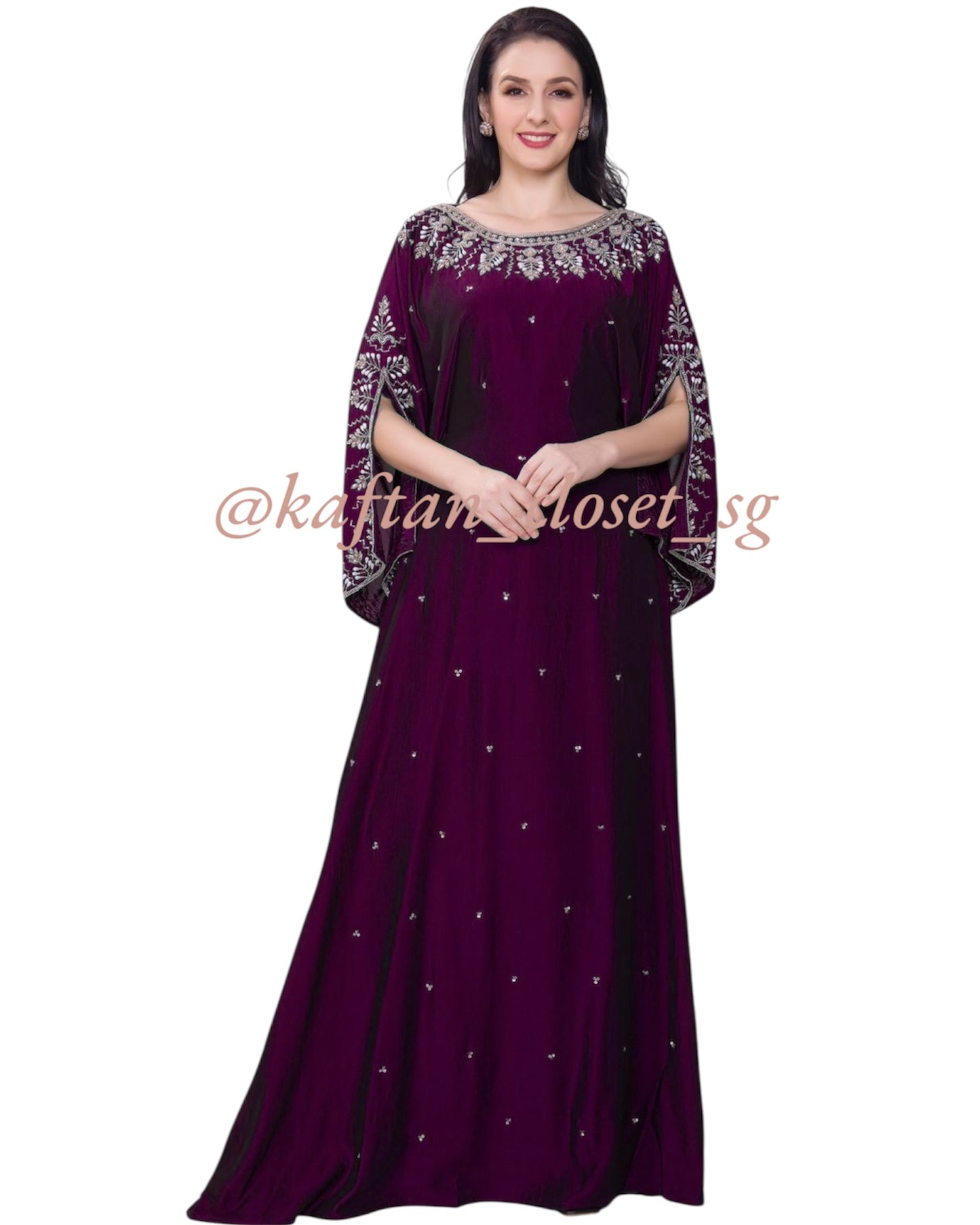 Beautiful female model wearing Burgundy open sleeves kaftans with white and pearl beadwork