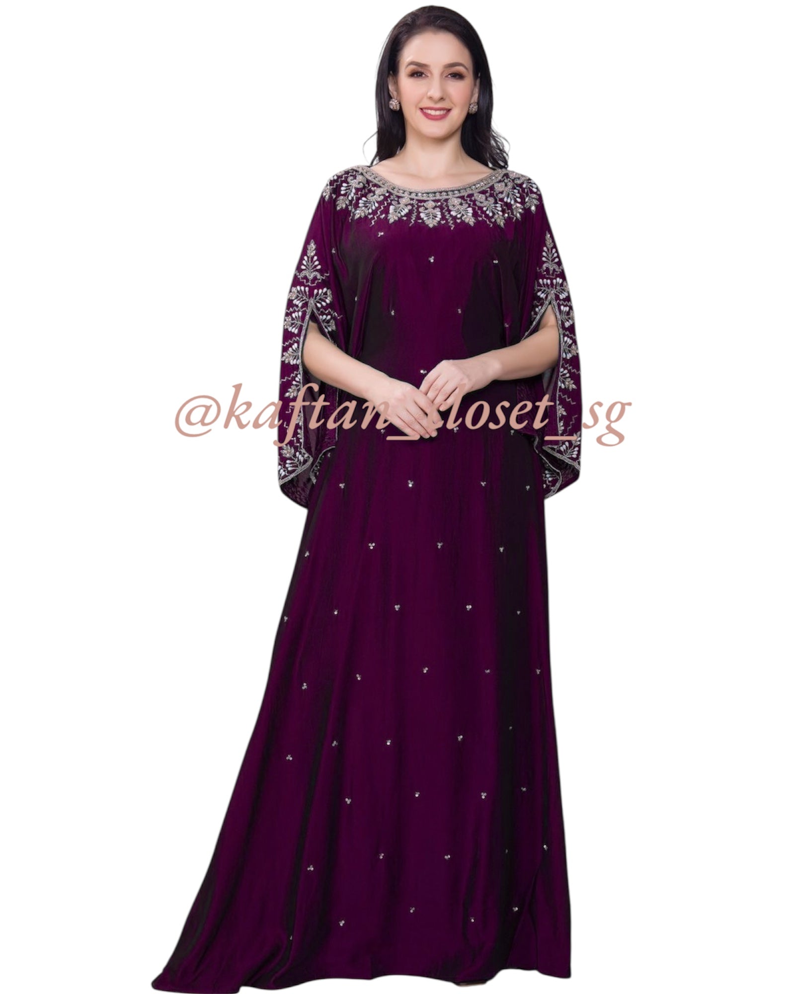 Beautiful female model wearing Burgundy open sleeves kaftans with white and pearl beadwork